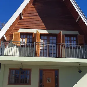 Quarto em Acomodações Particulares Silvérios Suítes Da Montanha